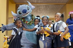 Stitch posing with kids in Nassau