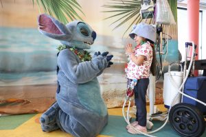 Stitch interacts with young patient at Lurie Children's