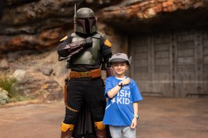 wish kid poses with Boba Fett