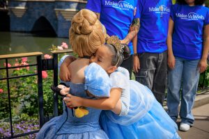 Wish kid Lilo hugging Cinderella