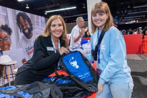 MAW rep poses with wish alum Mikayla
