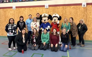 Harborview teachers pose with Captain Mickey and Captain Minnie