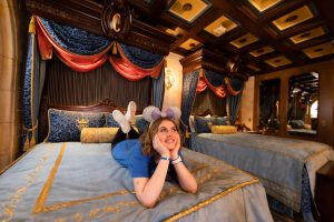 Mikayla on bed in Cinderella Suite