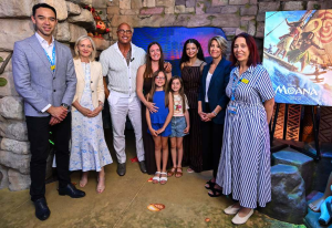 Catherine Laga'aia, Dwayne Johnson, GOSH family Sophie, Bella and Luna, and executives at the Disney Reef