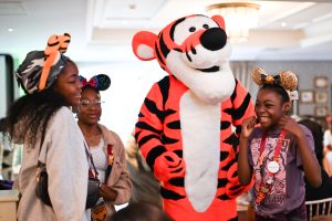 little girls smile and laugh with Tigger